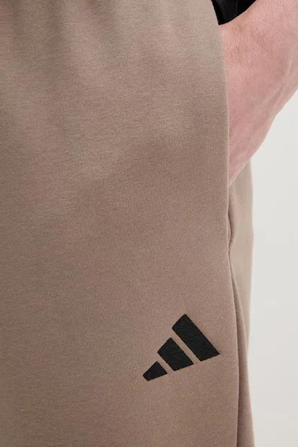 Спортивные штаны утепленные Essentials Feelcozy Adidas, коричневый — фото 4