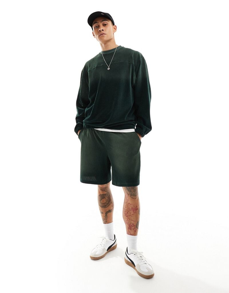 

Темно-зеленые велюровые шорты в рубчик оверсайз ASOS DESIGN