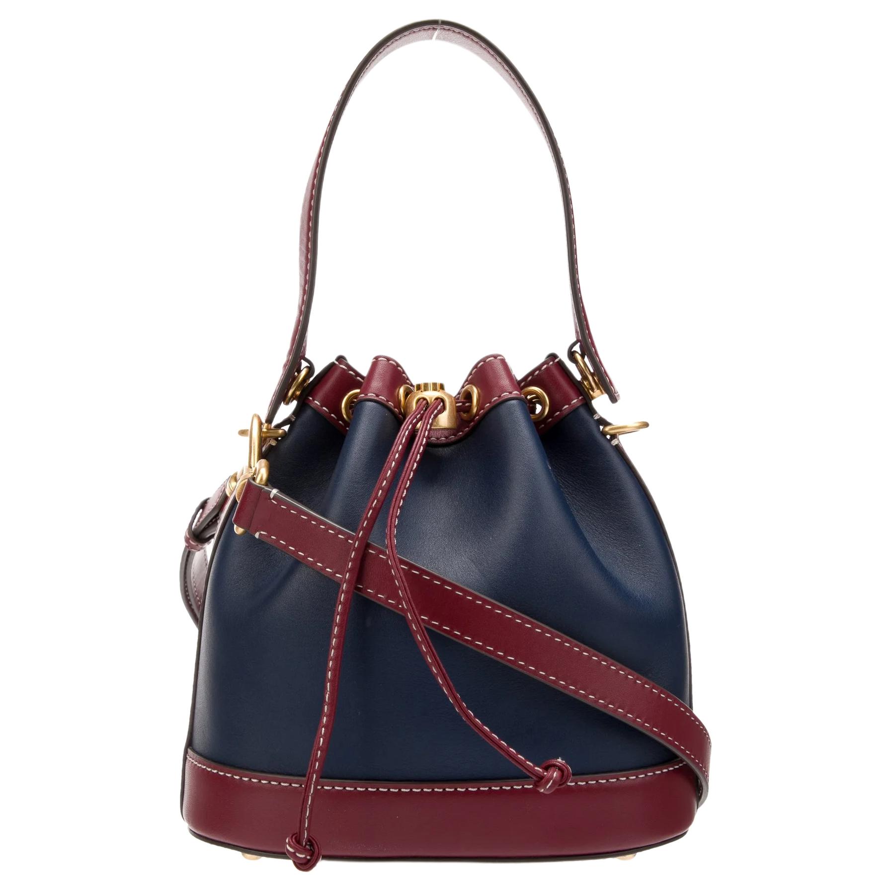 

TORY BURCH Сумка ведро из кожи коровы с монограммой T