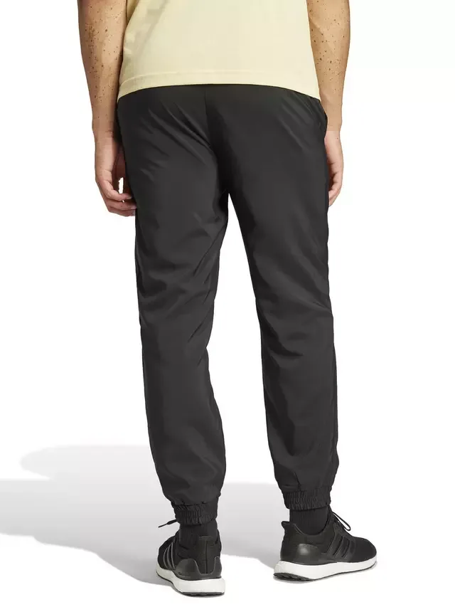 Спортивные брюки Essentials Logo Stanford Training Joggers, черно-белые adidas — фото 2