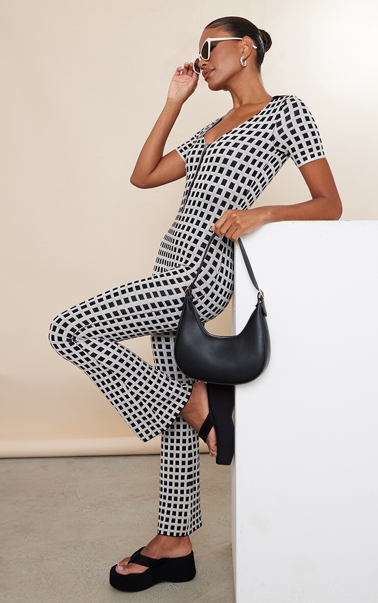 

PrettyLittleThing Бежевый вязаный комбинезон на молнии в клетку Vintage Check