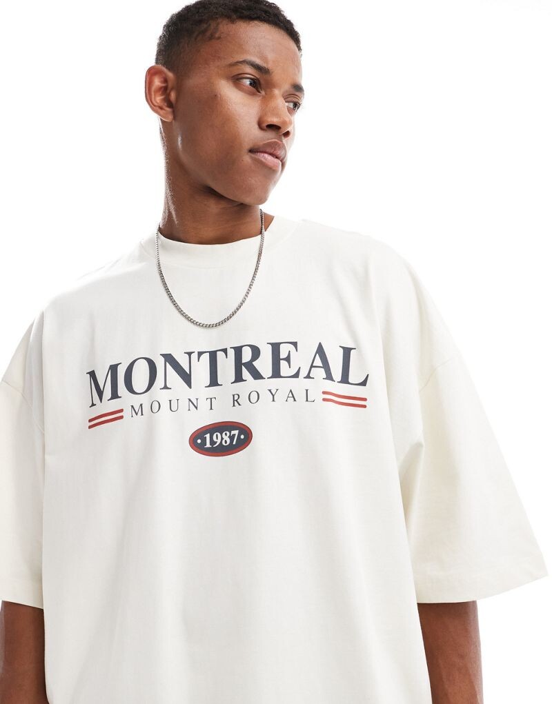 

ASOS DESIGN – футболка Extreme oversize кремового цвета с надписью Montreal на груди