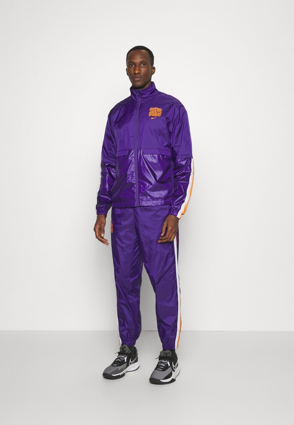 celebrity in tracksuit