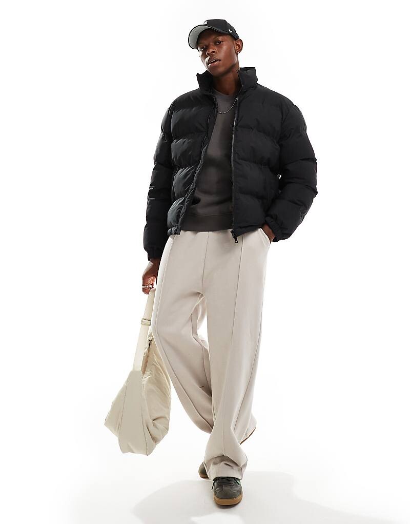 

Черная стеганая куртка Weekday Cole
