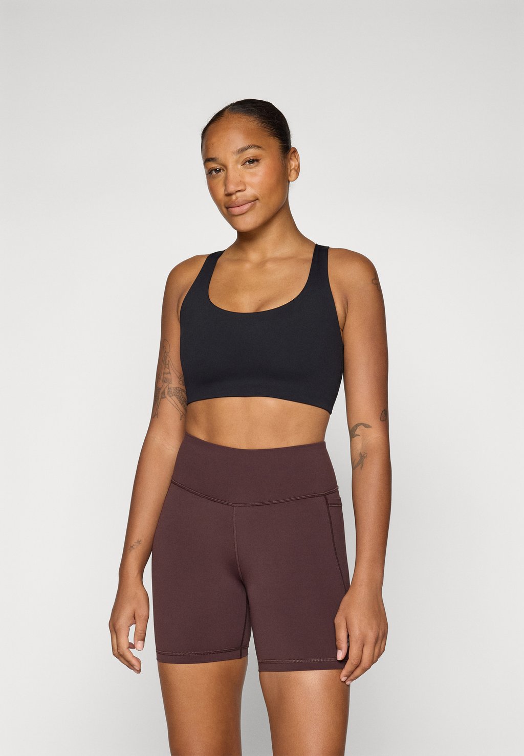 

Спортивный бюстгальтер с легкой поддержкой ULTIMATE YOGA RACERBACK BRA Sweaty Betty, черный