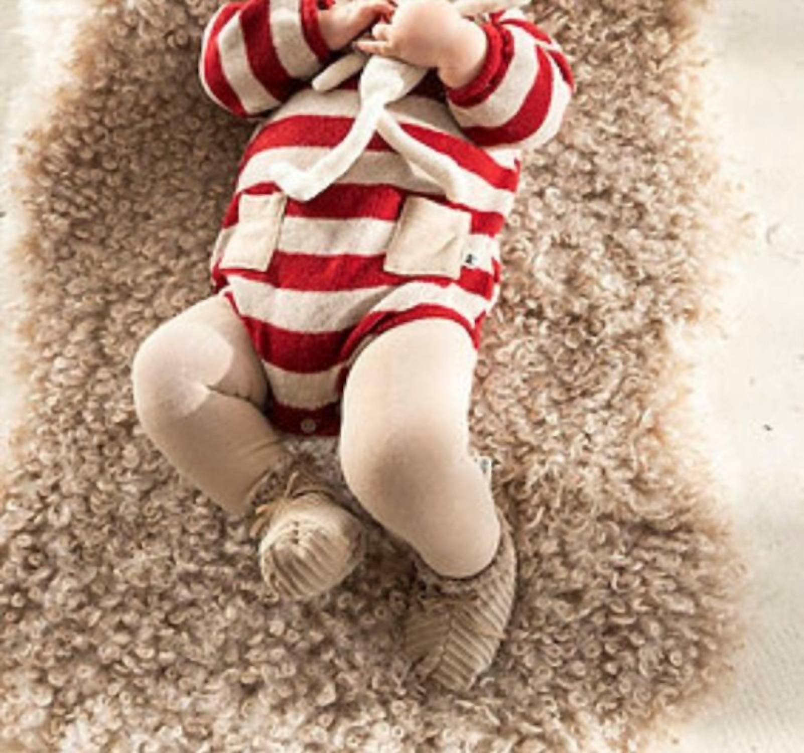 

Детский полосатый вязаный комбинезон Babys Stipey в красно-разноцветном цвете Petit Indi