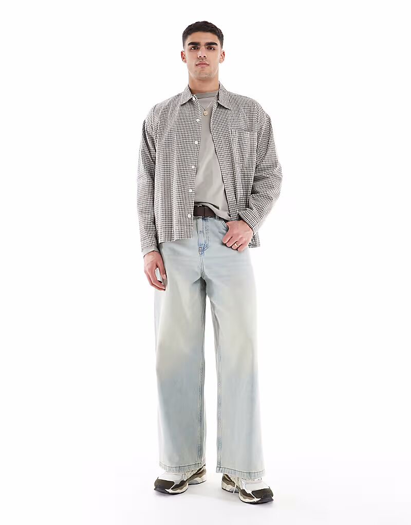 

Джинсы ASOS DESIGN супер-мешковатого кроя с винтажным оттенком светло-голубого цвета