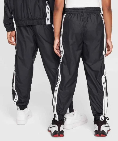 Детские штаны с защитой от загрязнений Nike K NK RPL CROSSOVER PANT FZ5237-010 чёрные — фото 2