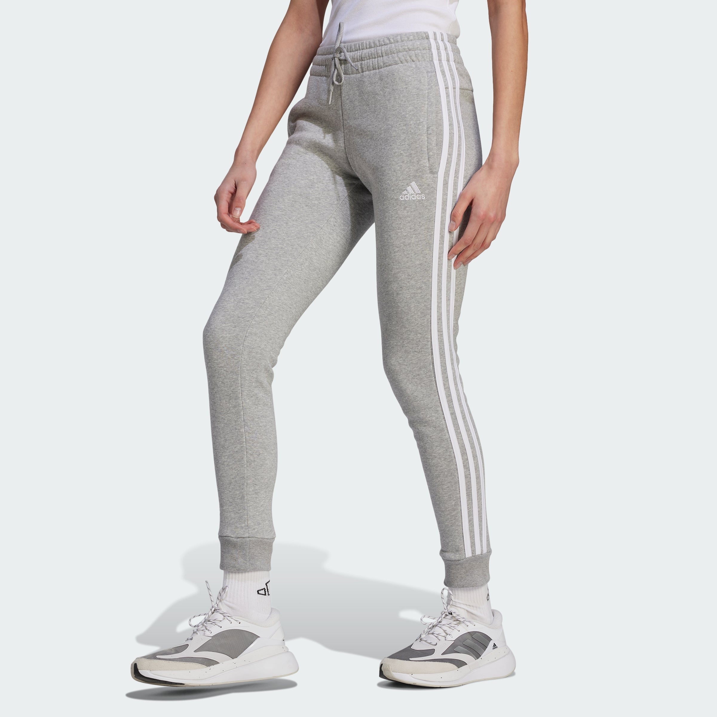 

Женские флисовые брюки Adidas Essentials с тремя полосками, цвет medium grey heather / white/il3282