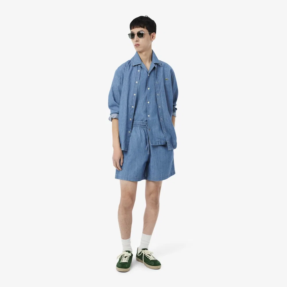 Мужские джинсовые шорты свободного кроя светло-синие от Lacoste — фото 4