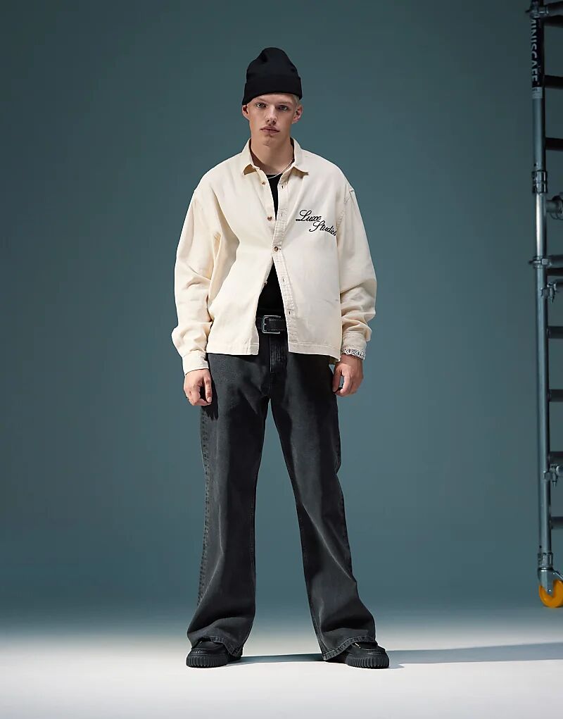

Широкие расклешенные джинсы черного цвета ASOS DESIGN