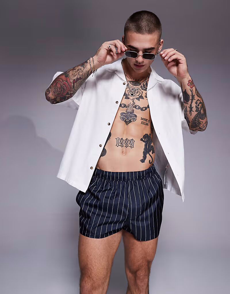 

Плавки ASOS DESIGN суперкороткой длины в тонкую синюю и белую полоску