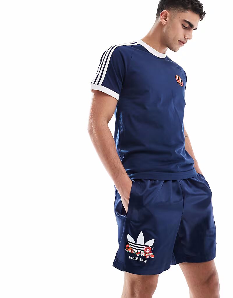 

Шорты Adidas Originals Q2 Made by Nelson Sprinter в цвете «ночной индиго»