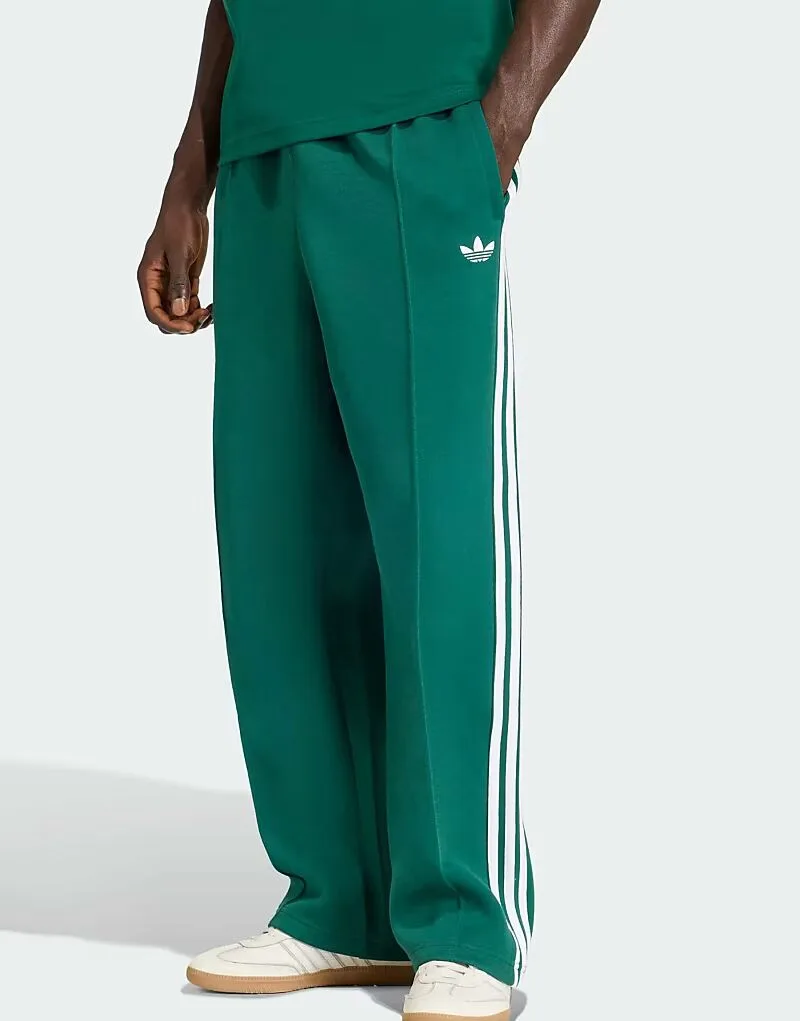 Спортивные брюки Adidas Originals Adicolor spacer baggy в цвете "колледжский зеленый"