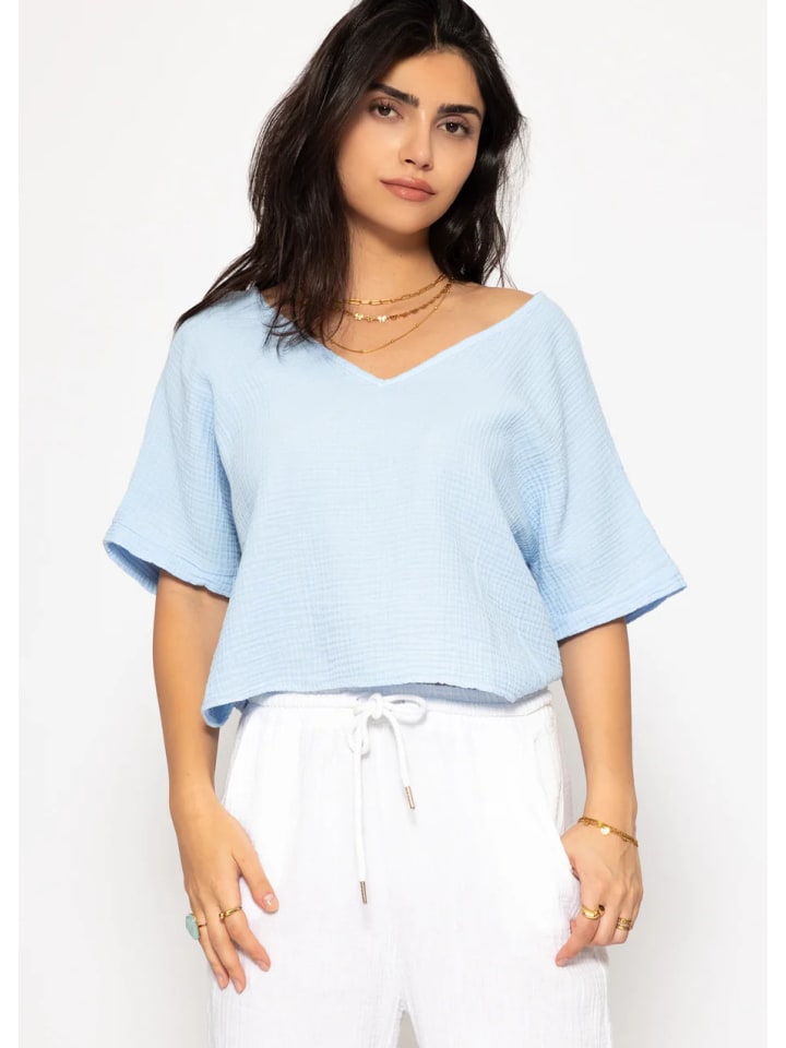 

Муслиновая рубашка с V-образным вырезом светло-голубого цвета SASSYCLASSY