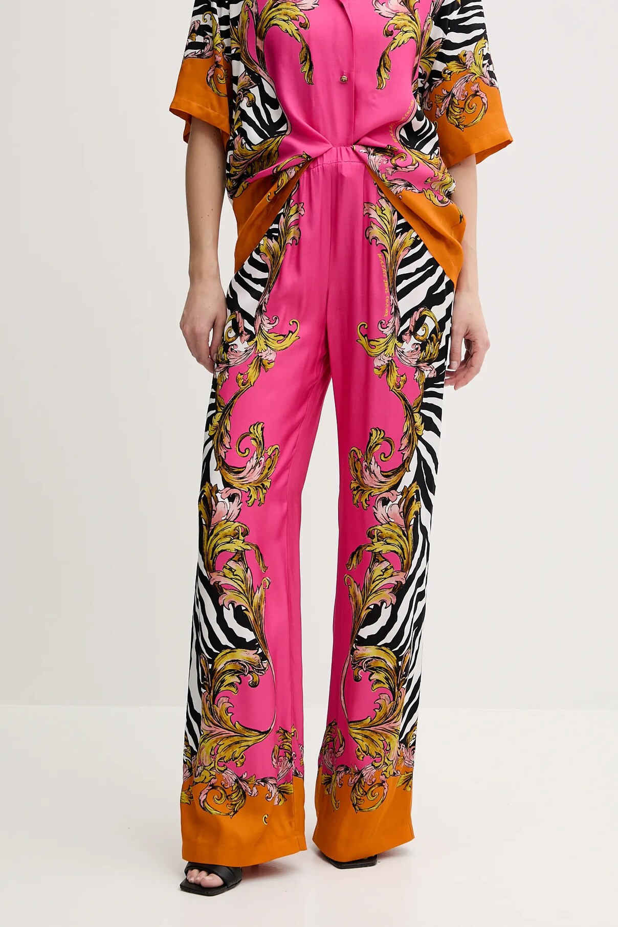 

Брюки Versace Jeans Couture, розовый