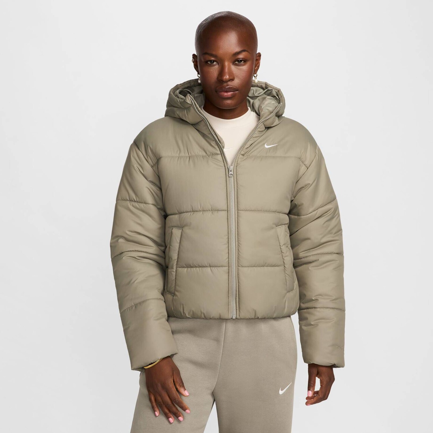 

Стеганая куртка с капюшоном Nike Sportswear, зеленый