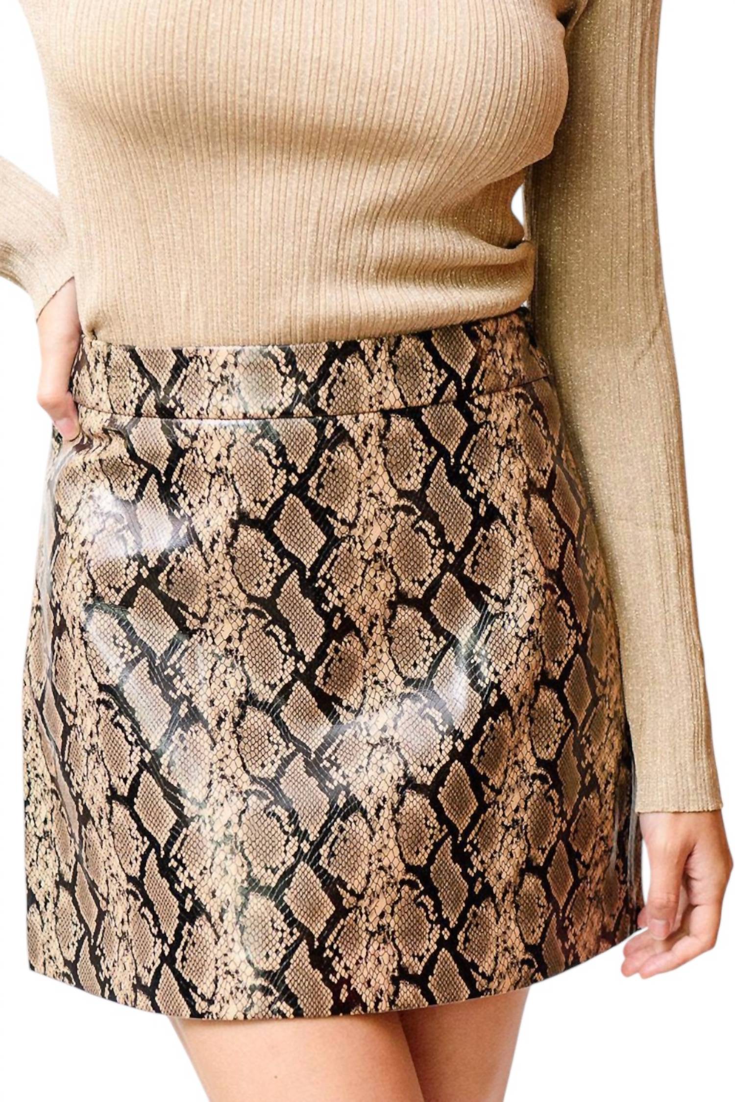 

Кожаная мини-юбка со змеиным принтом Suncoo, цвет snake print