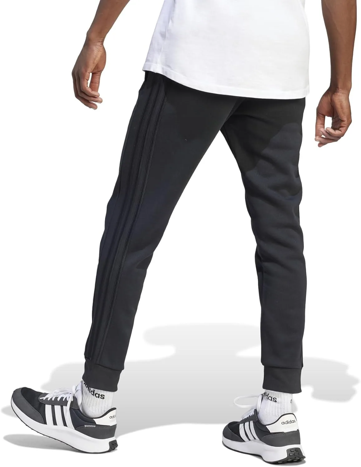 Мужские флисовые брюки Adidas Essentials с тремя полосками и зауженными манжетами, черный — фото 2