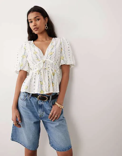 

Белый топ с баской и цветочным принтом Nothing's Child Cordelia