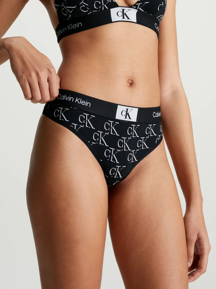 

Calvin Klein Underwear String "MODERN THONG", с принтом по всей поверхности, черный