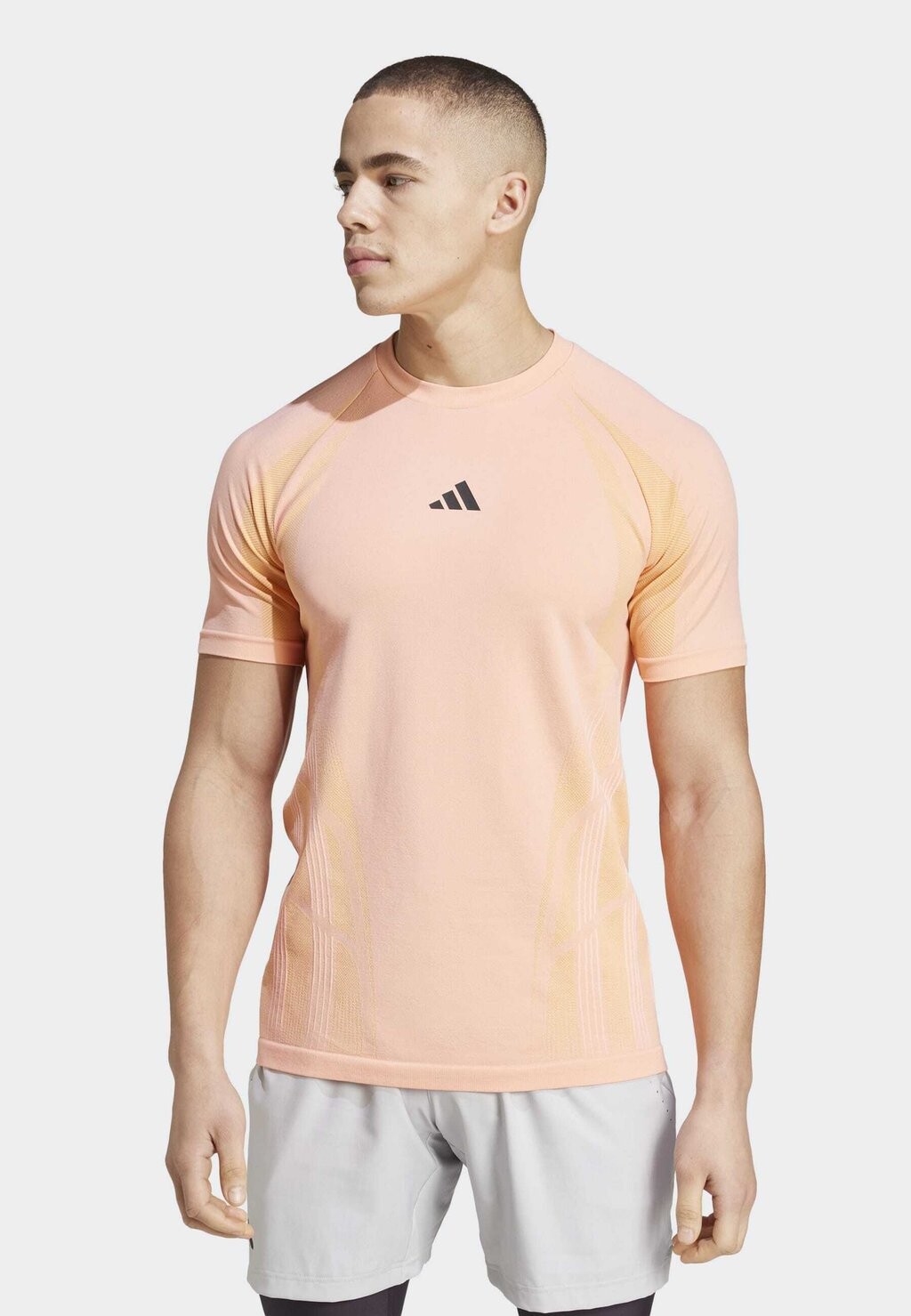 

Спортивная футболка TENNIS PRO SEAMLESS AEROREADY FREELIFT adidas, светло-розовый
