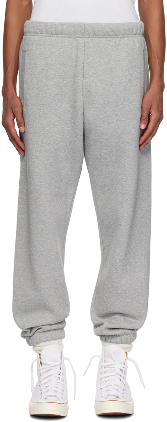 

Серые спортивные штаны Chase Carhartt Work In Progress, Grey heather/Gold