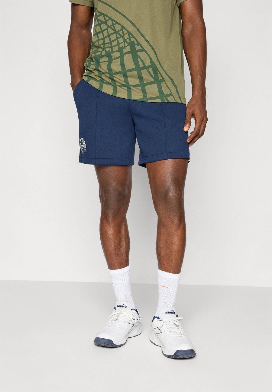 

Спортивные шорты Lacoste Sport SHORT HERITAGE, Navy Blue/White/Dark Blue