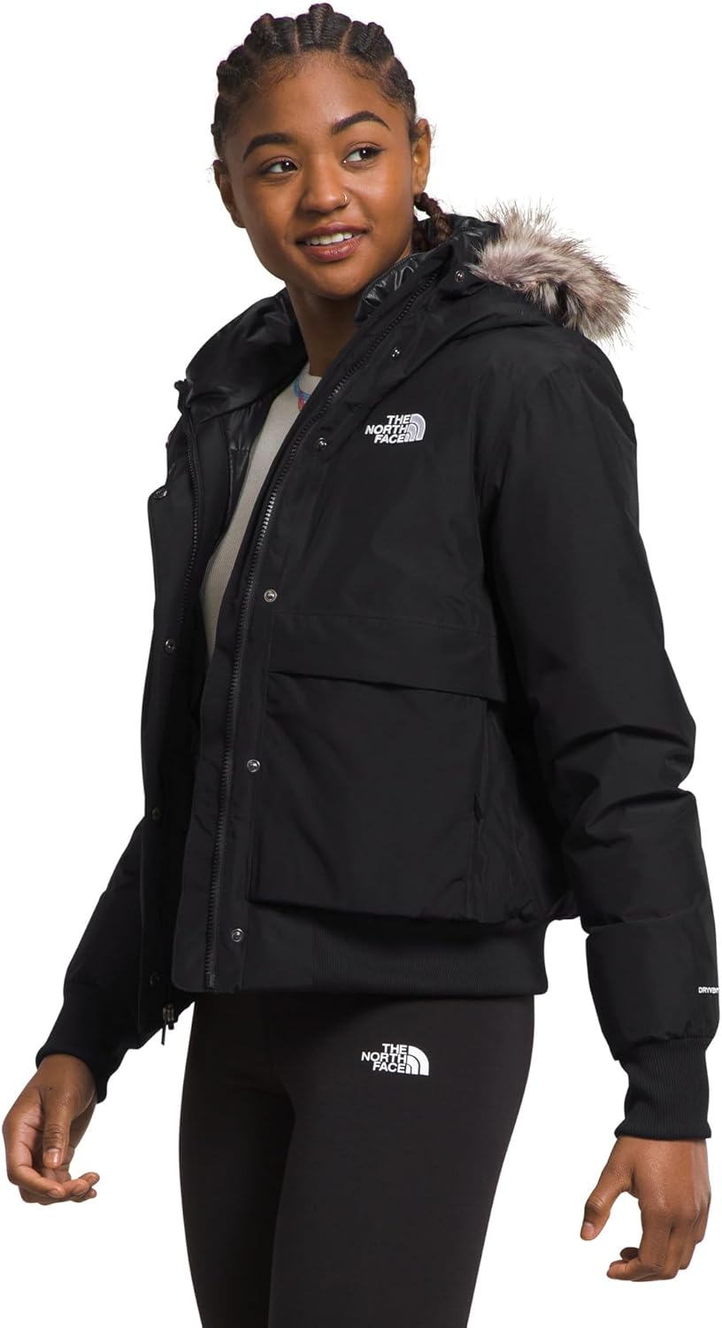 

THE NORTH FACE Женская арктическая куртка-бомбер с утеплением пухом, водонепроницаемой оболочкой, регулируемым капюшоном с искусственным мехом и карманами с двусторонним доступом, Tnf Black-npf