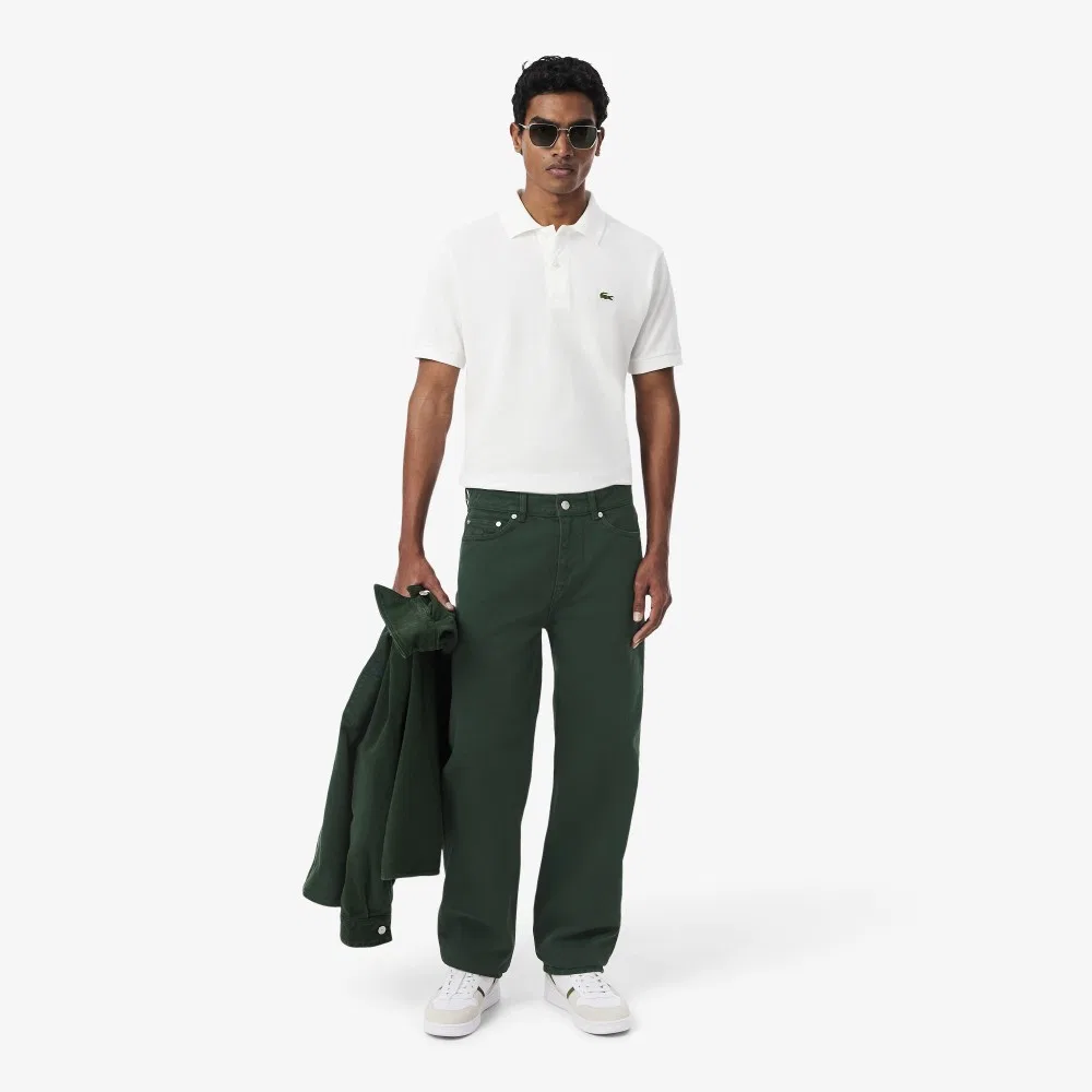 Мужские цветные джинсы глубокого зелёного цвета от Lacoste