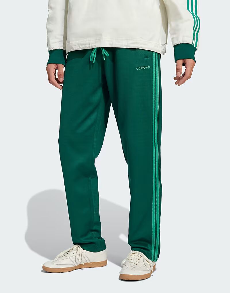 

Спортивные брюки Adidas Originals в студенческом зеленом цвете