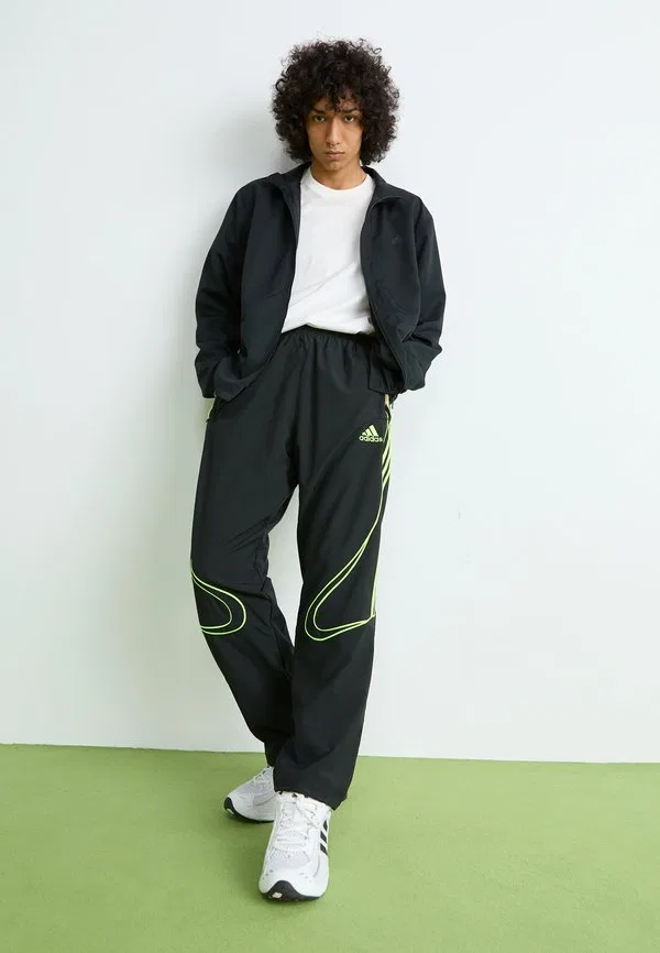 Спортивные штаны teamgeist Adidas Originals, Black/Signal Green — фото 2