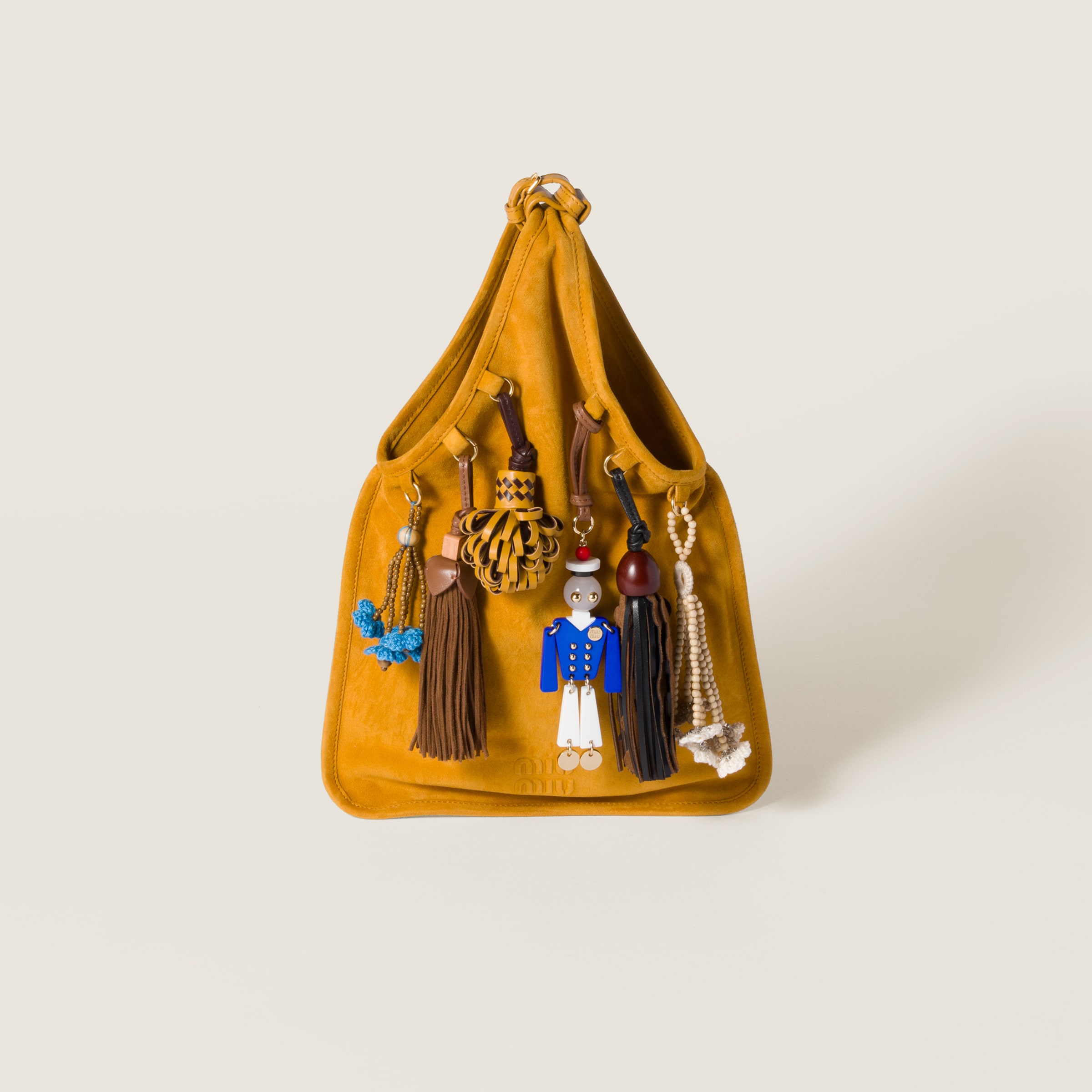 

Замшевая сумка с фокусом MIU MIU, виски