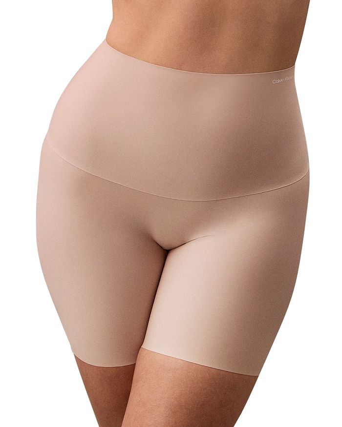 

Укороченные шорты-утягивающие до середины бедра Calvin Klein, коричневый/бежевый