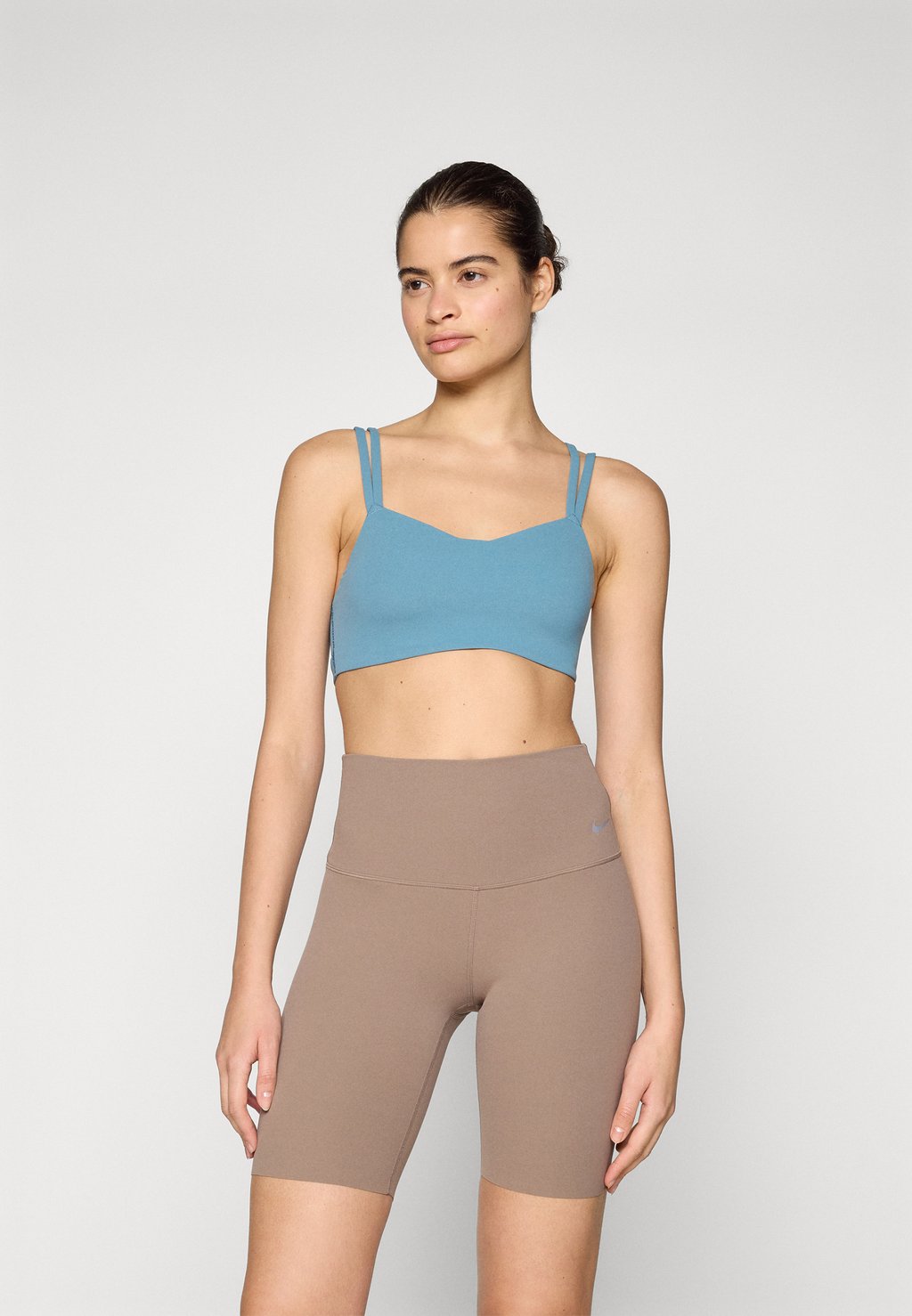 

Спортивный бюстгальтер с легкой поддержкой ALATE TRACE BRA Nike Performance, синий