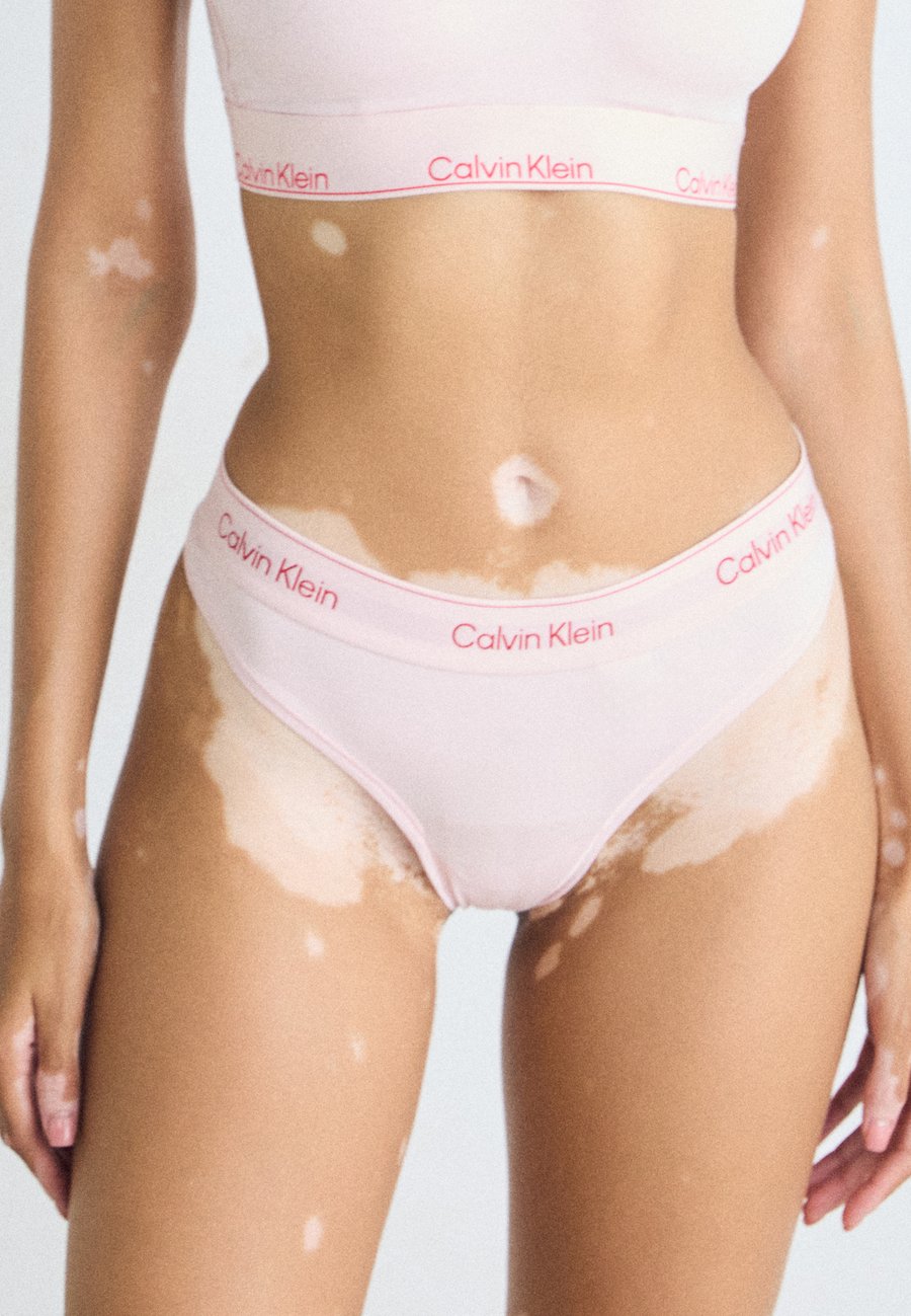 

Трусы Calvin Klein Underwear THONG ICON COTTON MODAL, Potpourri/Light Pink
