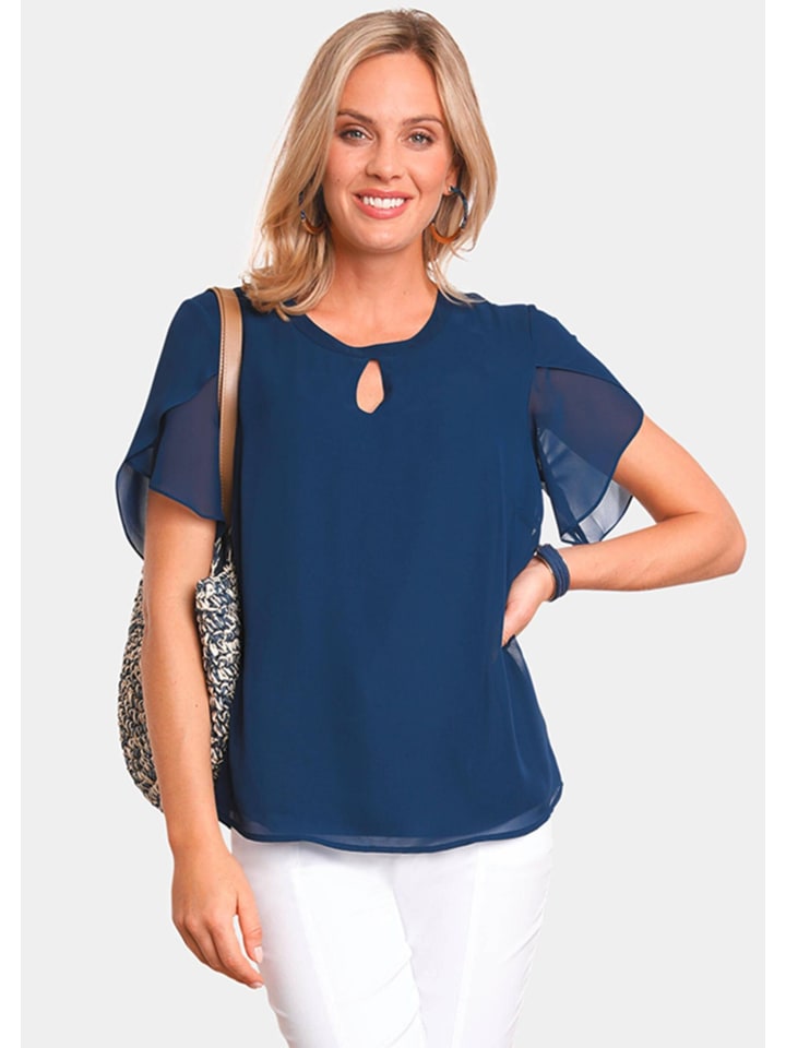 

Короткий размер: блузка с интересным дизайном рукавов королевского синего цвета. GOLDNER