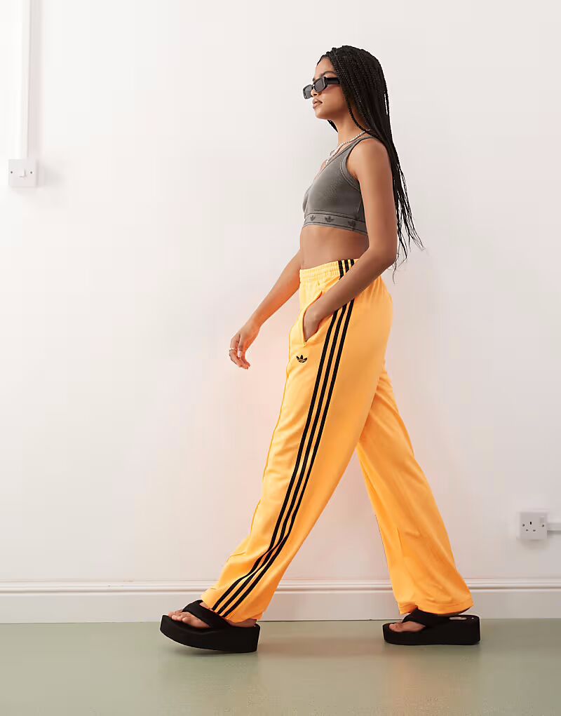 

Свободные спортивные брюки Firebird оранжевого и черного цветов Adidas Originals