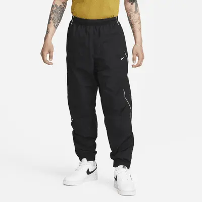 

Брюки Nike Solo Swoosh, черный/белый
