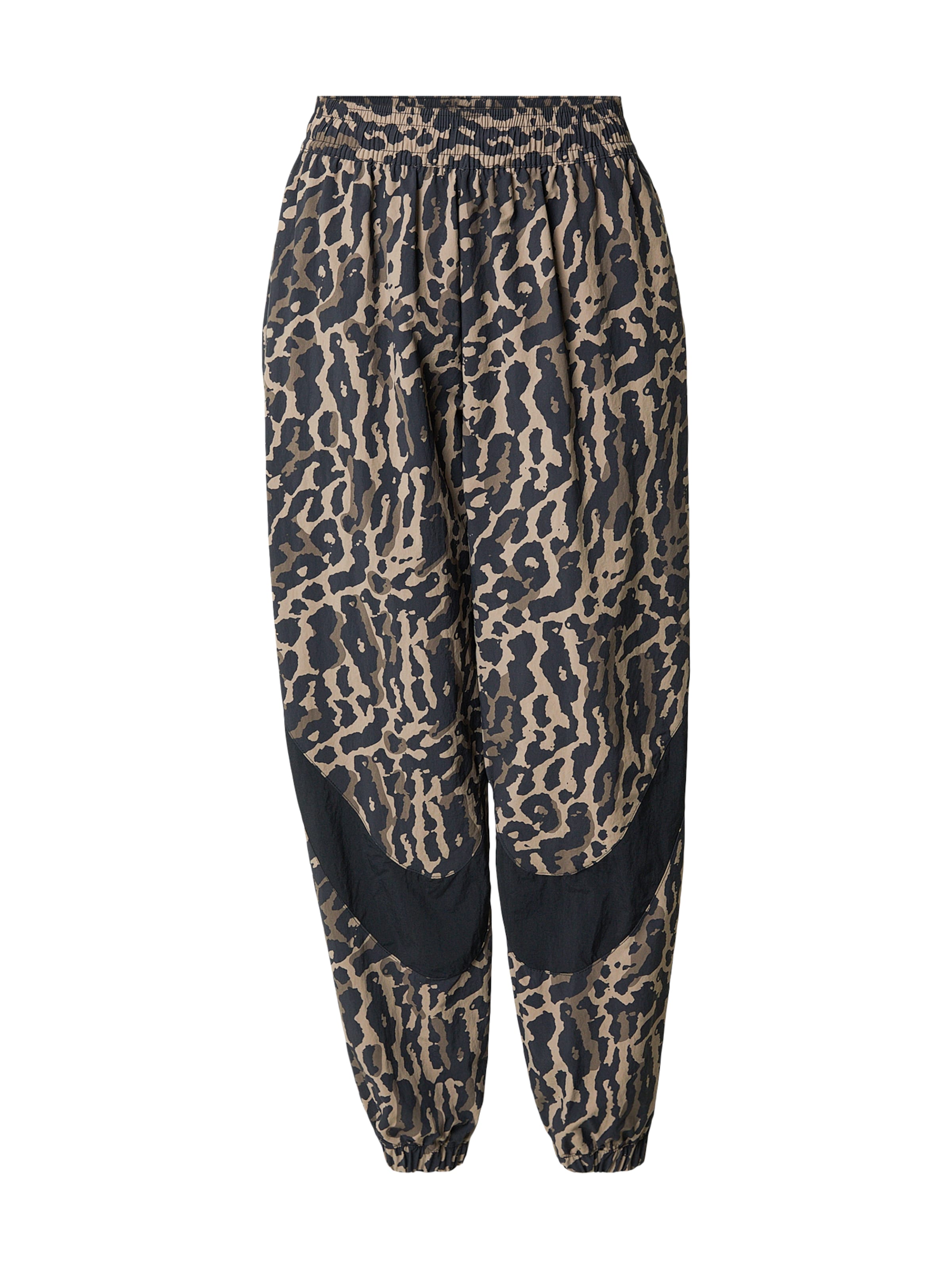 

Nike Sportswear Брюки с зауженным низом в черном цвете