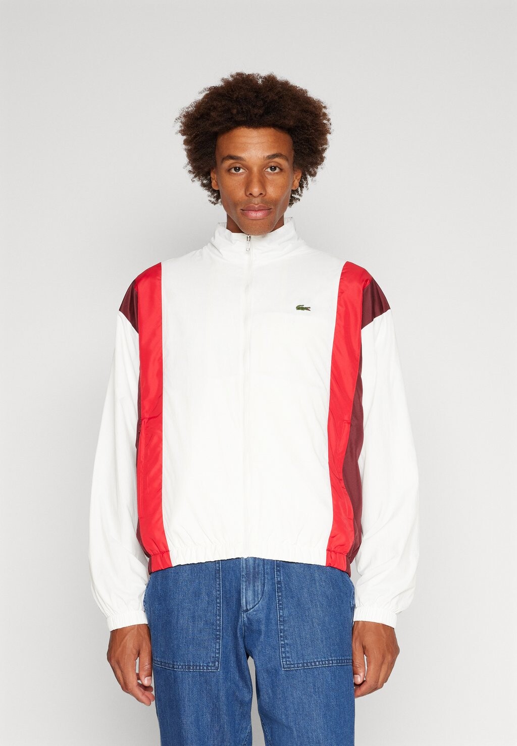 

Легкая куртка SHOWERPROOF TRACKJACKET Lacoste, цвет flour/spleen red