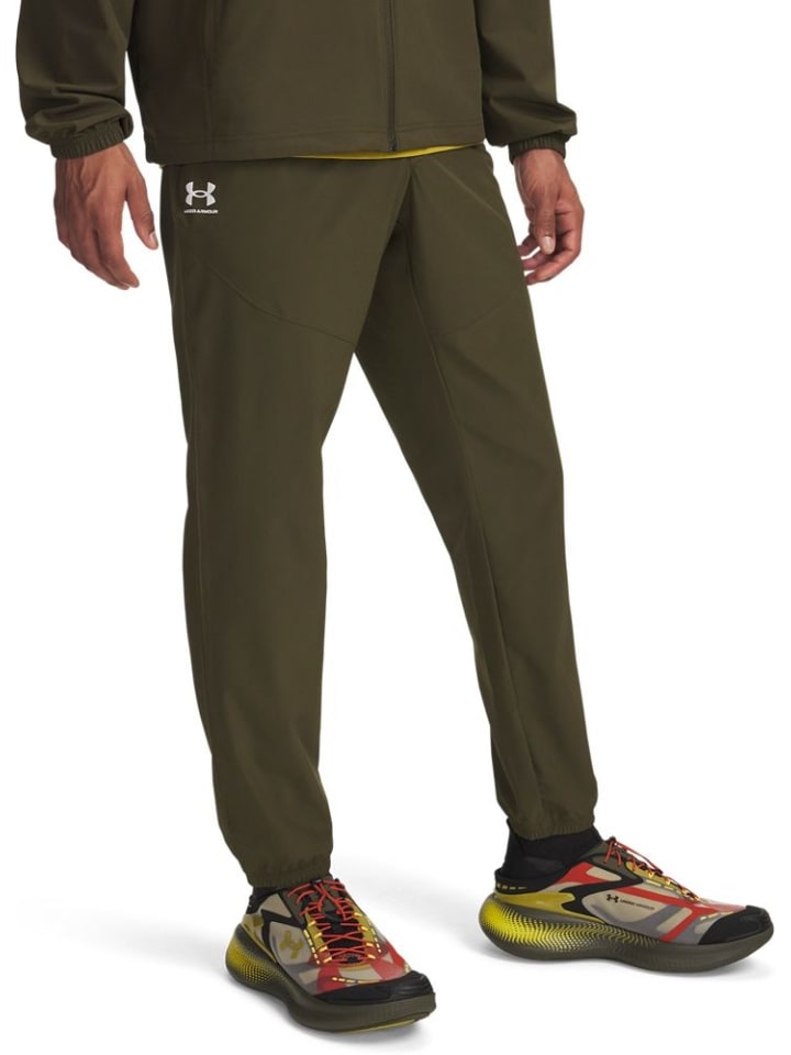 

Спортивные брюки Vibe Woven Jogger зеленого цвета Under Armour