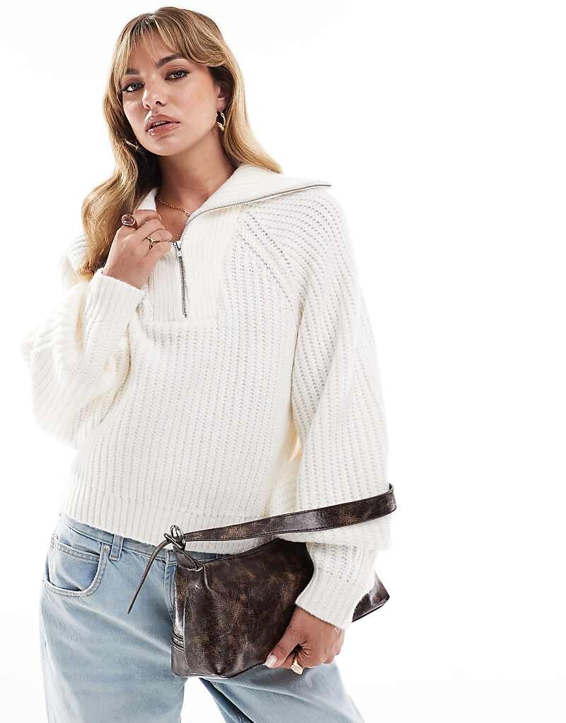 

ASOS DESIGN – Кремово-белый свитер с высоким воротником, воротником стойкой, короткой молнией и объемными рукавами