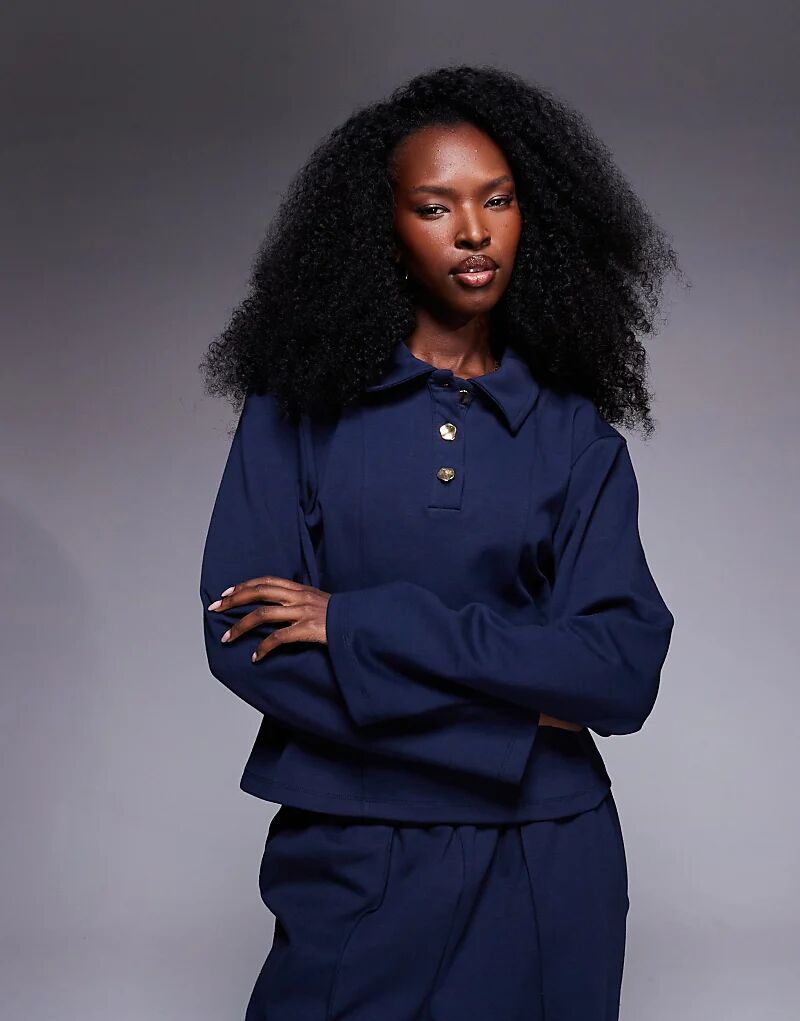 

Лонгслив ASOS DESIGN, сочетающий в себе элементы интерлока, с застежкой на талии и длинными рукавами, темно-синего цвета