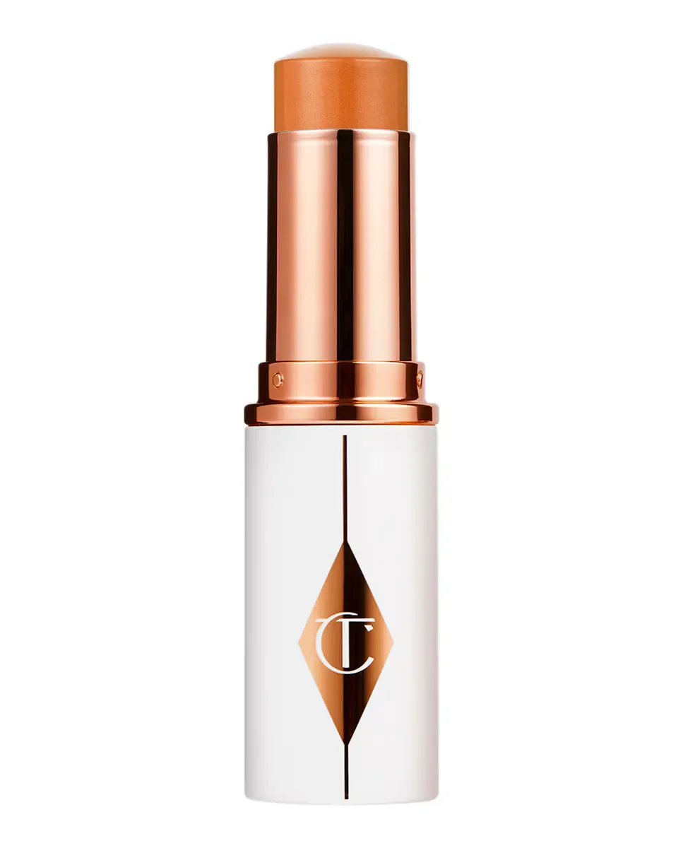 Тональная основа Unreal Skin Sheer Glow Tint-Hydrating Charlotte Tilbury, 10 Tan