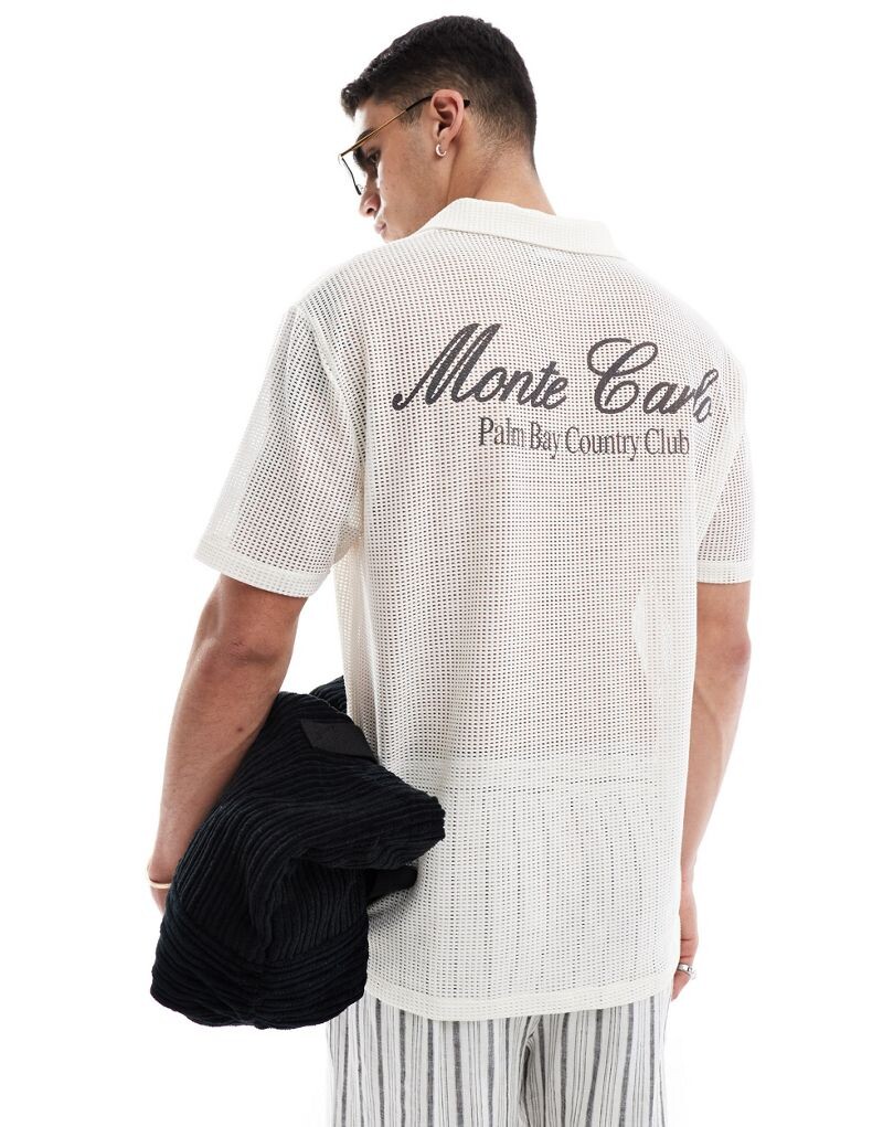 

Свободное белое поло с принтом на спине ASOS DESIGN