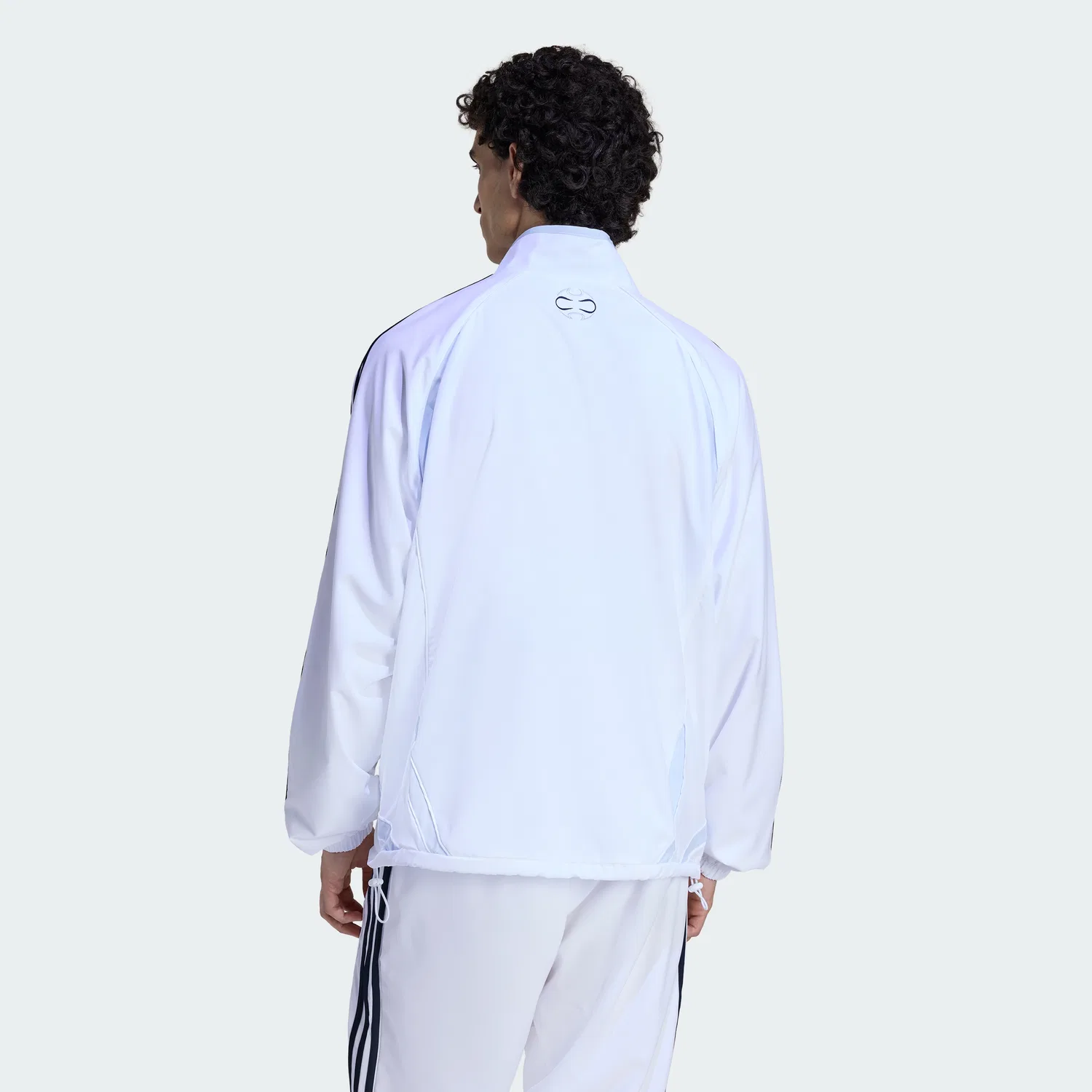 Мужская спортивная куртка Teamgeist Adicolor Track Top белая от Adidas — фото 2