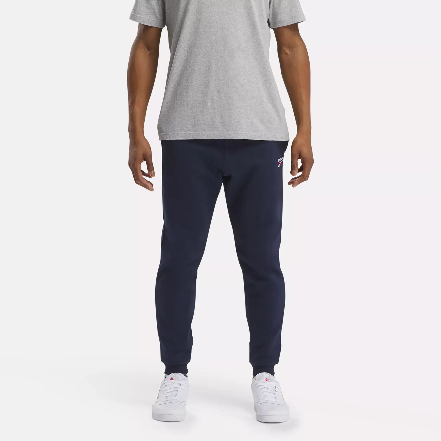 

Флисовые джоггеры с маленьким логотипом Identity Reebok, индиго