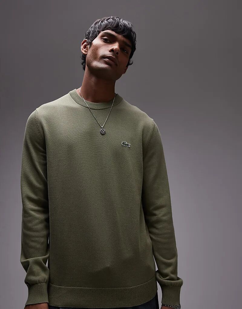 

Вязать джемпер в кахки Lacoste