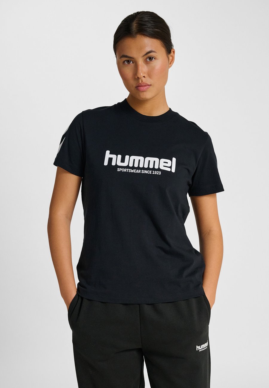 

Футболка Hummel HMLLEGACY 2.0 W S/S, Black, Черный, Футболка Hummel HMLLEGACY 2.0 W S/S, Black